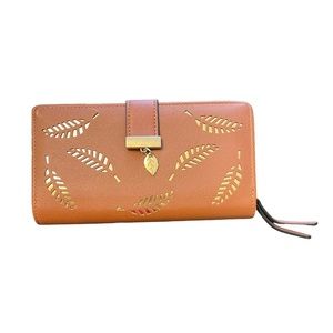 Women Leather Wallet Engraved in Brown and gold color.